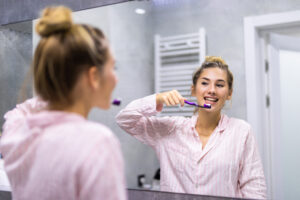 https://www.freepik.com/free-photo/beautiful-young-woman-brushing-teeth-front-her-bathroom-mirror-selective-focus_20269841.htm#fromView=keyword&page=1&position=17&uuid=9a387d57-7eec-416f-bbbc-7db Woman brushing her teeth 
